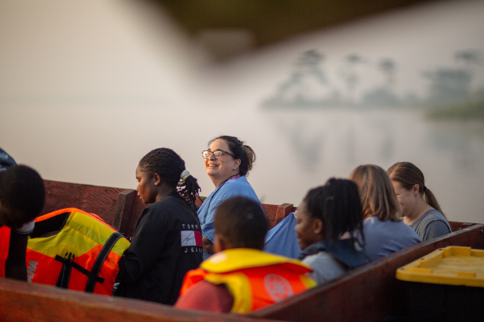 Team on boat crossing Lake Victoria